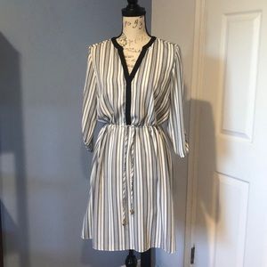 Nice black and white dress.